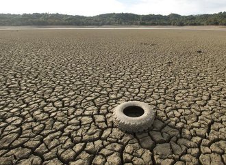 650326-a-tire-rests-on-the-dry-bed-of-lake-mendocino-a-key-mendocino-county-reservoir-in-ukiah.jpg