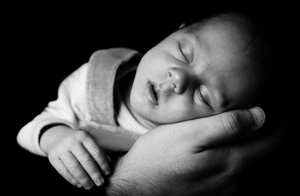 sleeping-baby-on-a-hand.jpg